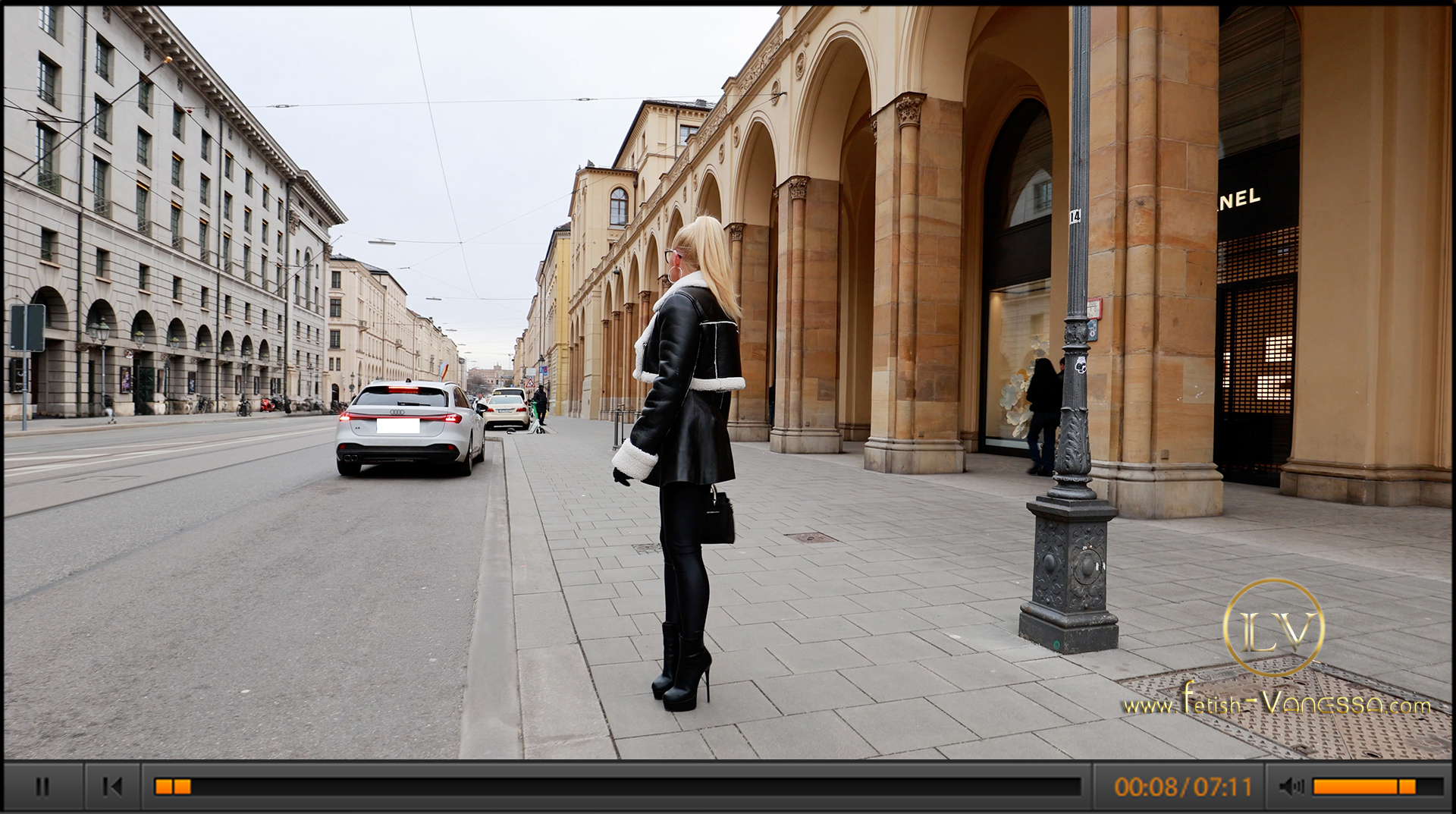 In the heart of Munich, while the Munich Security Conference fills the city with uniforms and security barriers, the video shows Lady Vanessa confidently walking through the streets.

Her black leather mini dress, Lycra leggings, and high platform ankle boots make her a striking eye-catcher. In front of the Bavarian State Opera, the sound of her heels echoes across the square like a confident heartbeat.

Munich winters may be icy, but with this cool, sexy leather look, even the coldest night seems to glow.

Kisses 💋
Lady Vanessa 😘